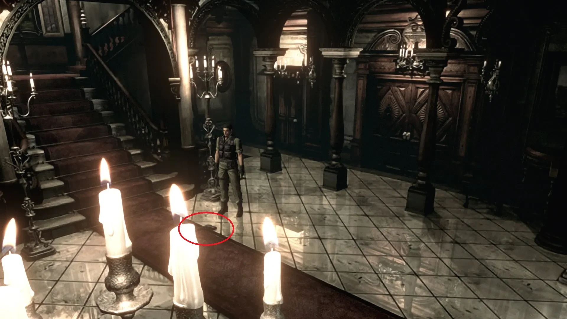 Chris standing near a circled Handgun in Resident Evil